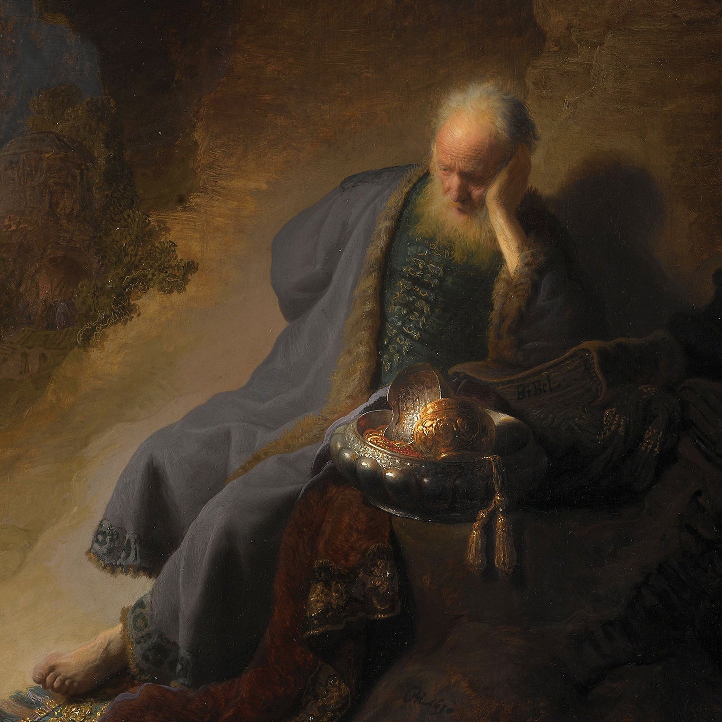 The painting, **Jeremiah Lamenting the Destruction of Jerusalem**, depicts an elderly man, likely the biblical prophet Jeremiah, leaning his head on his right hand while seated. He wears a fur-lined robe and rests beside a silver bowl filled with golden objects. The dark, cave-like background enhances the emotional depth of this artwork.