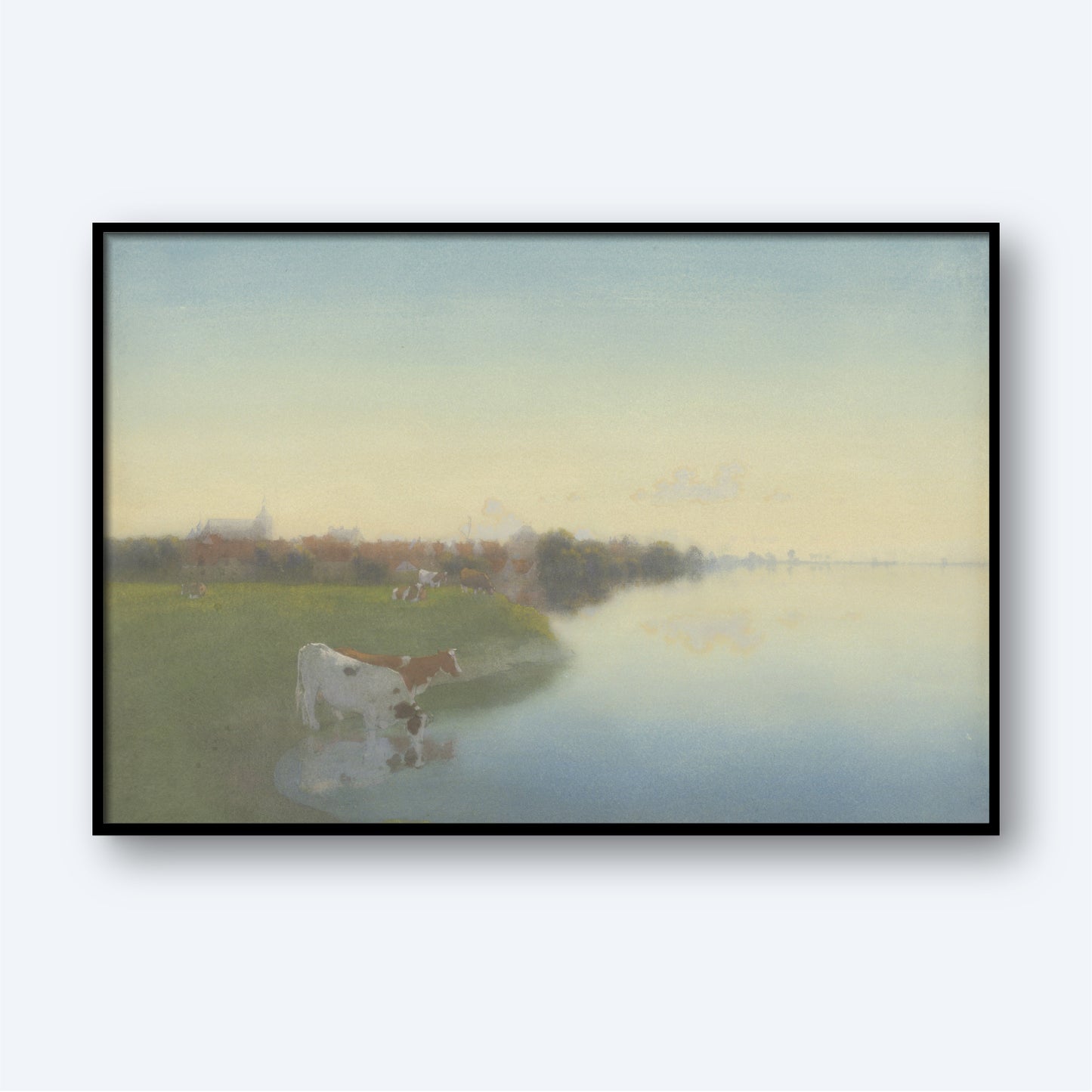 Bank Of The River Ijssel Near Hattem by Jan Voerman captures a serene Dutch countryside with a calm riverbank bathed in the early morning light. A cow stands peacefully near the water's edge, while the distant background reveals hazy silhouettes of buildings and greenery beneath a soft, pastel-colored sky. This tranquil landscape wall art exudes the calming charm characteristic of Voerman's work.