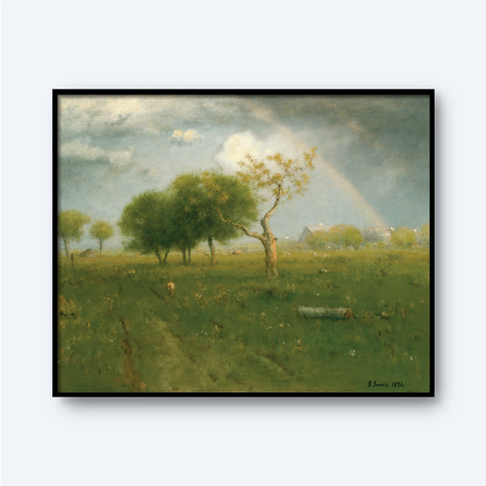 After a Summer Shower by George Inness Print portrays a pastoral landscape with a rainbow arching across the sky. Trees are scattered across the green field, with a small figure in the distance and several buildings near the horizon. The scene exudes peaceful stillness, enhanced by high-quality Lustre surface paper. The artwork is signed by George Inness and dated 1874.