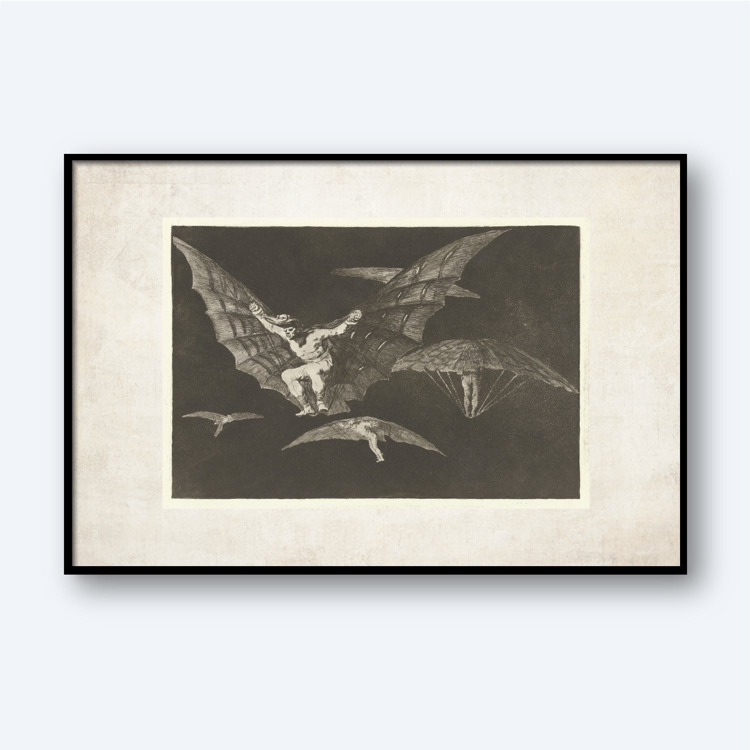A framed etching titled "A Way of Flying" by Francisco Goya. It depicts a man asleep at his desk with monstrous bats and owls flying behind him, symbolizing the chaos that emerges when reason is abandoned. The background is dark and ominous.