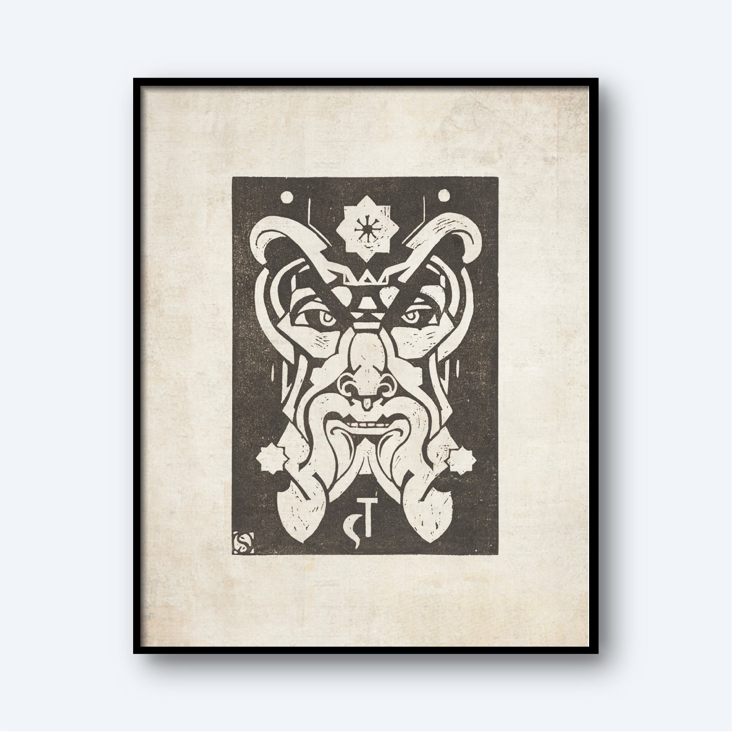 The framed monochromatic artwork, titled "Saturnus - Planet Masks by Henri van der Stok," features a symmetrical abstract face with exaggerated features and intricate patterns, reminiscent of the artist's distinct style. The design includes a star above the face and decorative elements, all rendered in black ink on a cream-colored background, perfectly capturing the essence of surreal wall art.