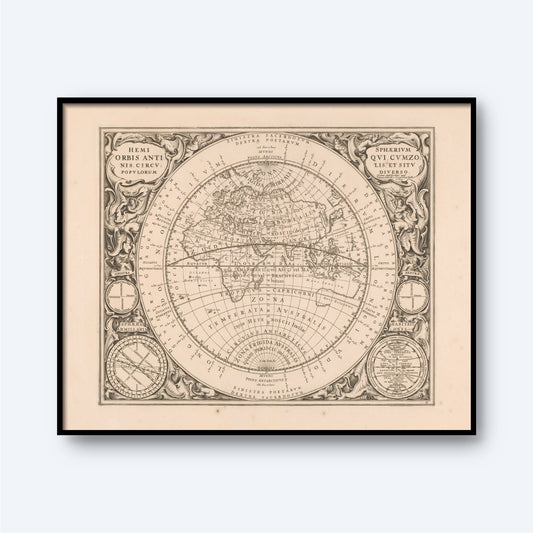 The Map of the Eastern Hemisphere is a framed vintage world map featuring ornate detailing and Latin inscriptions. This ancient-inspired map depicts various regions and continents with intricate borders and embellishments. In the bottom corners, two circular diagrams are potentially illustrating Zodiac signs.