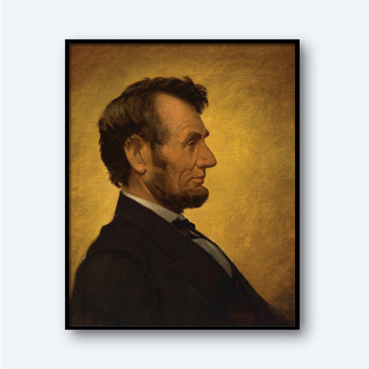 A portrait titled "Abraham Lincoln by William Willard" depicts a man in a black suit with a white shirt and black bow tie. The subject, bearing a striking resemblance to the iconic President Abraham Lincoln, features his distinctive hairstyle and beard. He is shown in profile against a golden-brown background, and the painting is elegantly framed in a black rectangular frame.