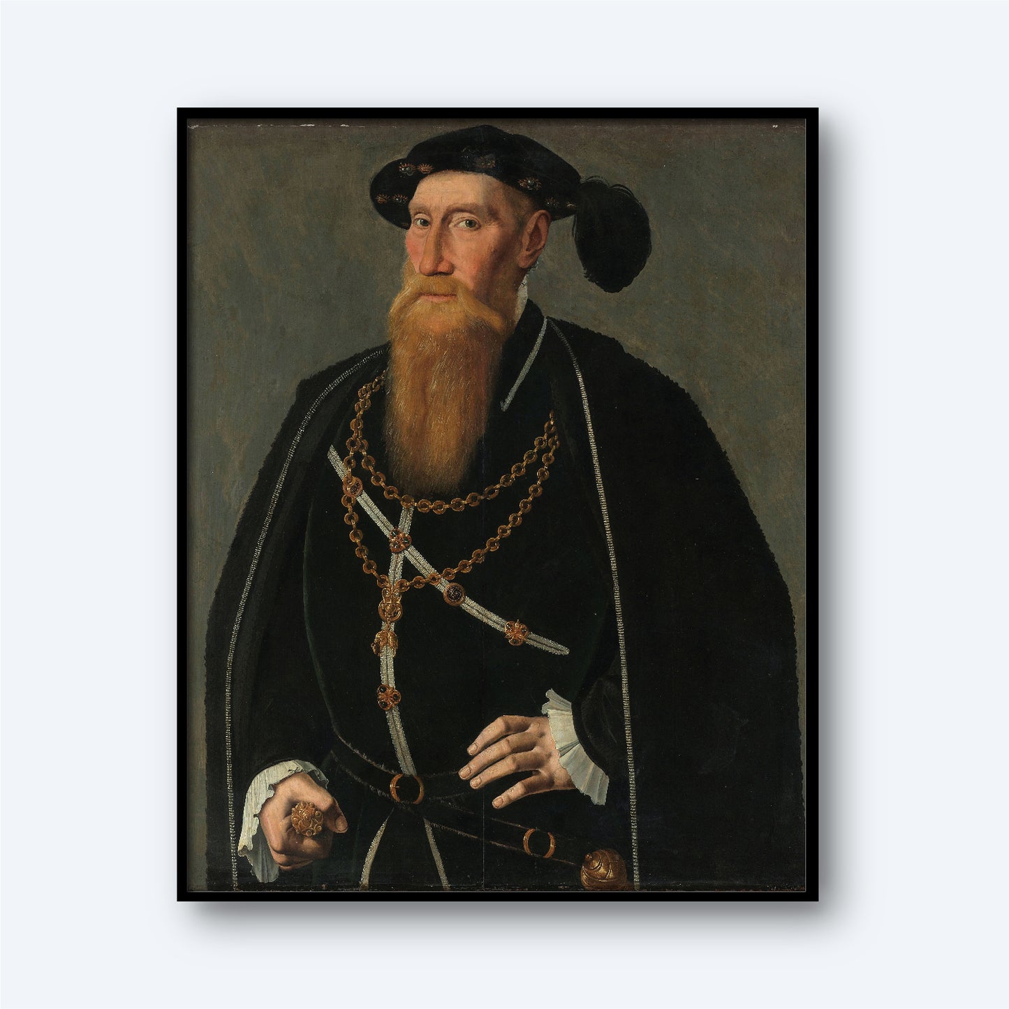The painting "Portrait of Reinoud III van Brederode - Lord of Vianen" by Jan van Scorel depicts a bearded man dressed in black Renaissance attire, capturing the essence of 16th-century portraiture. He wears a heavy gold chain around his neck, and a black hat adorned with a feather. One hand holds a glove, while the other rests on his waist. His gaze is directed forward with a neutral expression.