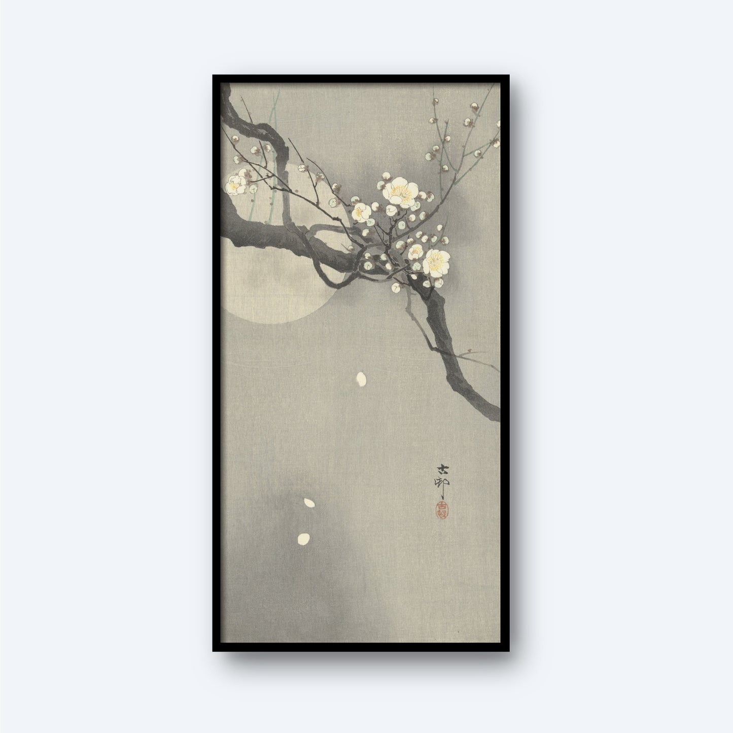 The framed vertical artwork titled "Plum blossom and full moon by Ohara Koson" features a serene scene with blooming white plum blossoms on a branch set against a misty, muted gray background. A faint full moon enhances the tranquil atmosphere in the backdrop, and Japanese calligraphy is present near the bottom of the image.