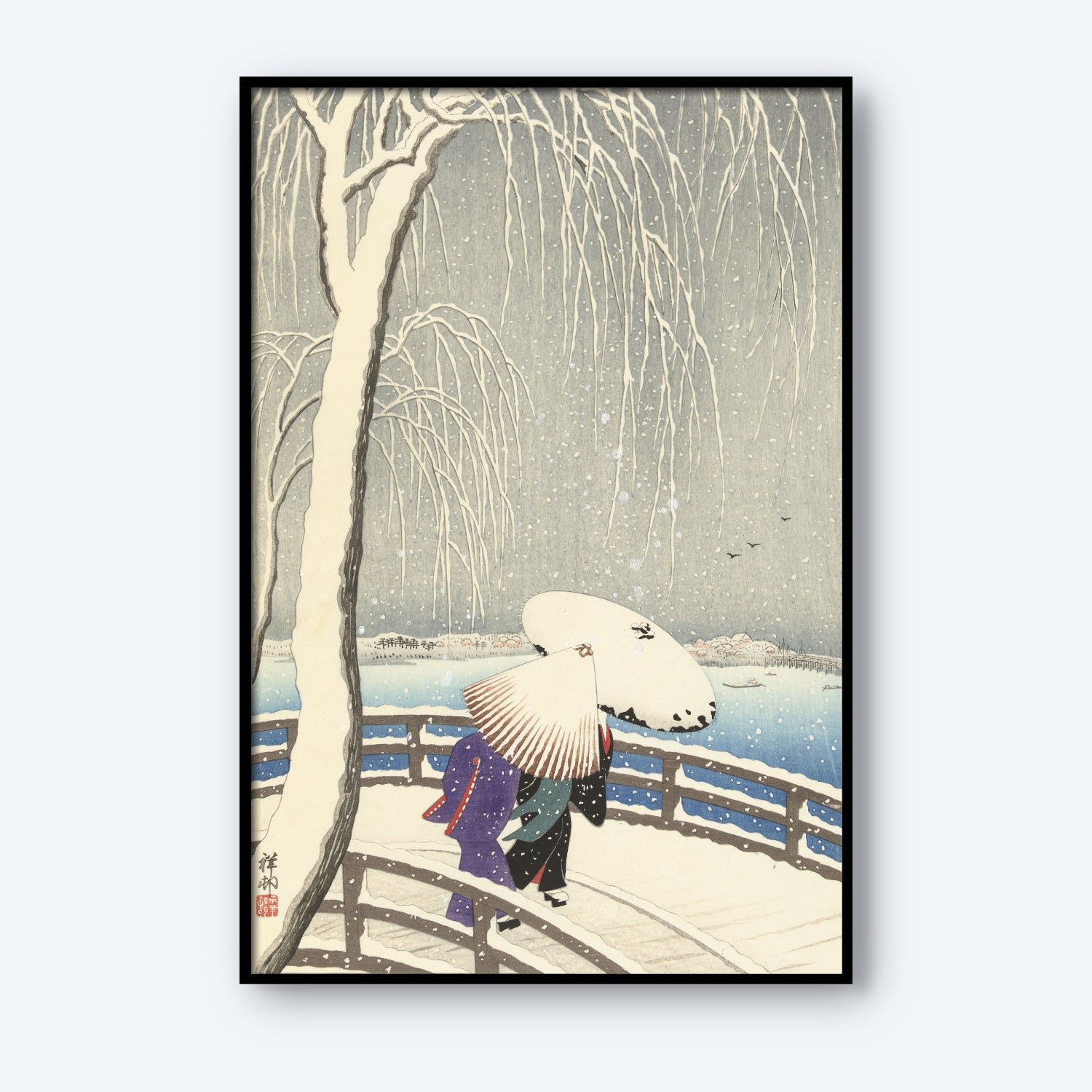 The "Snow on Willow Bridge Ohara Koson" framed artwork beautifully captures a tranquil winter scene featuring two figures holding umbrellas as they walk across a curved wooden bridge. To the left, a snow-covered willow tree adds to the serene ambiance, while a calm, snow-laden landscape extends into the background beneath a muted gray sky. This captivating piece of wall art brings an air of serenity to any space.