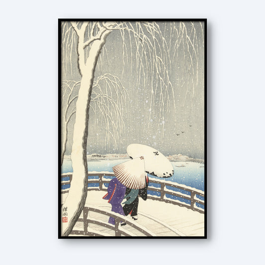 The "Snow on Willow Bridge Ohara Koson" framed artwork beautifully captures a tranquil winter scene featuring two figures holding umbrellas as they walk across a curved wooden bridge. To the left, a snow-covered willow tree adds to the serene ambiance, while a calm, snow-laden landscape extends into the background beneath a muted gray sky. This captivating piece of wall art brings an air of serenity to any space.