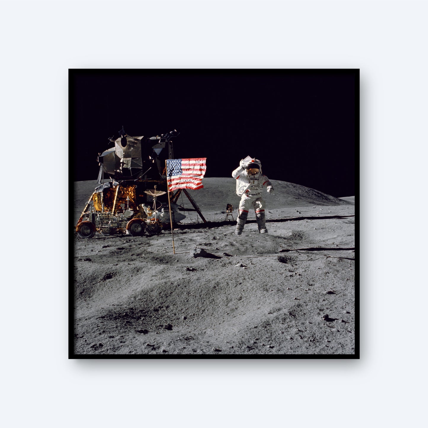 An astronaut stands on the moon’s surface, saluting the American flag. Behind the astronaut, a NASA Apollo 1972 lunar module is visible, representing humanity's 5th moon landing. The barren, cratered lunar landscape stretches into the background. The Earth and stars are not visible in the black sky.