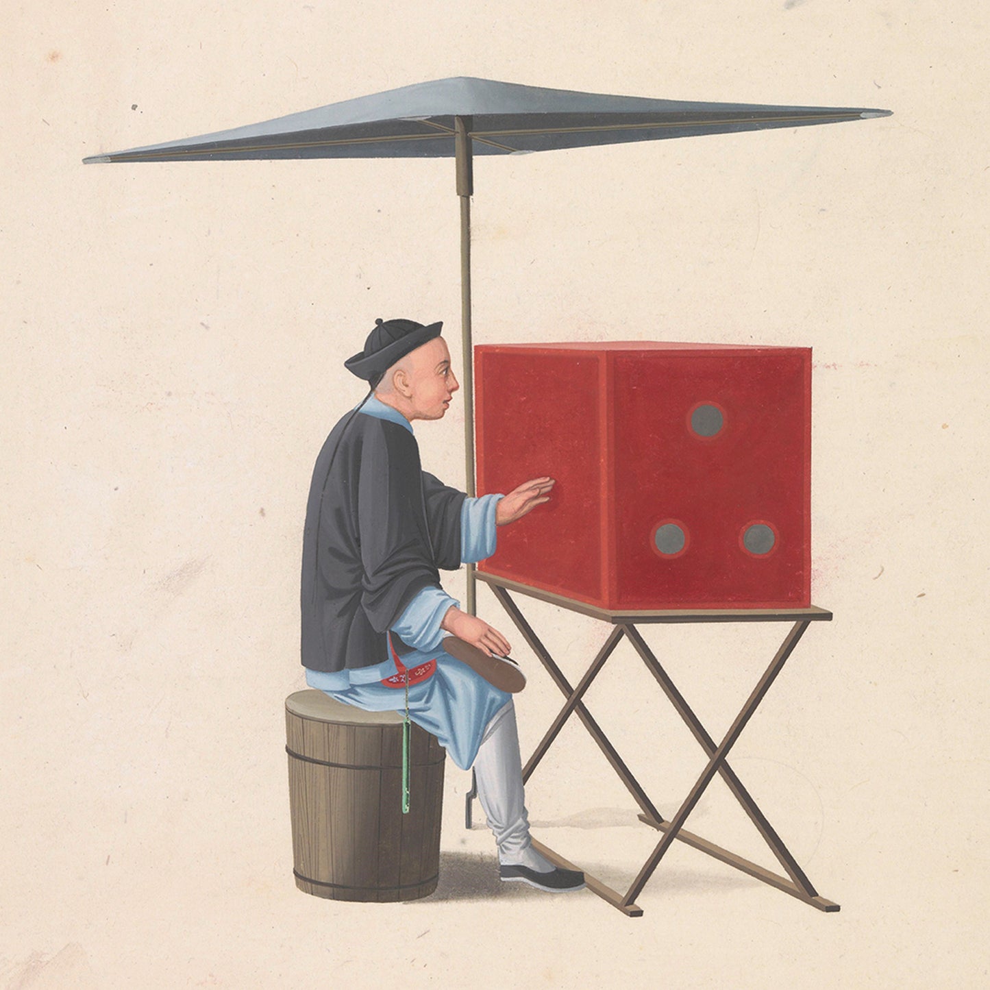 A man dressed in traditional Chinese attire sits on a wooden barrel under a large umbrella. He is interacting with a Chinese Kijkkast Print shadow box featuring three circular, green-tinted windows on one side. The vibrant red Chinese Kijkkast Print is placed on a folding stand, creating an intriguing cultural crossover.