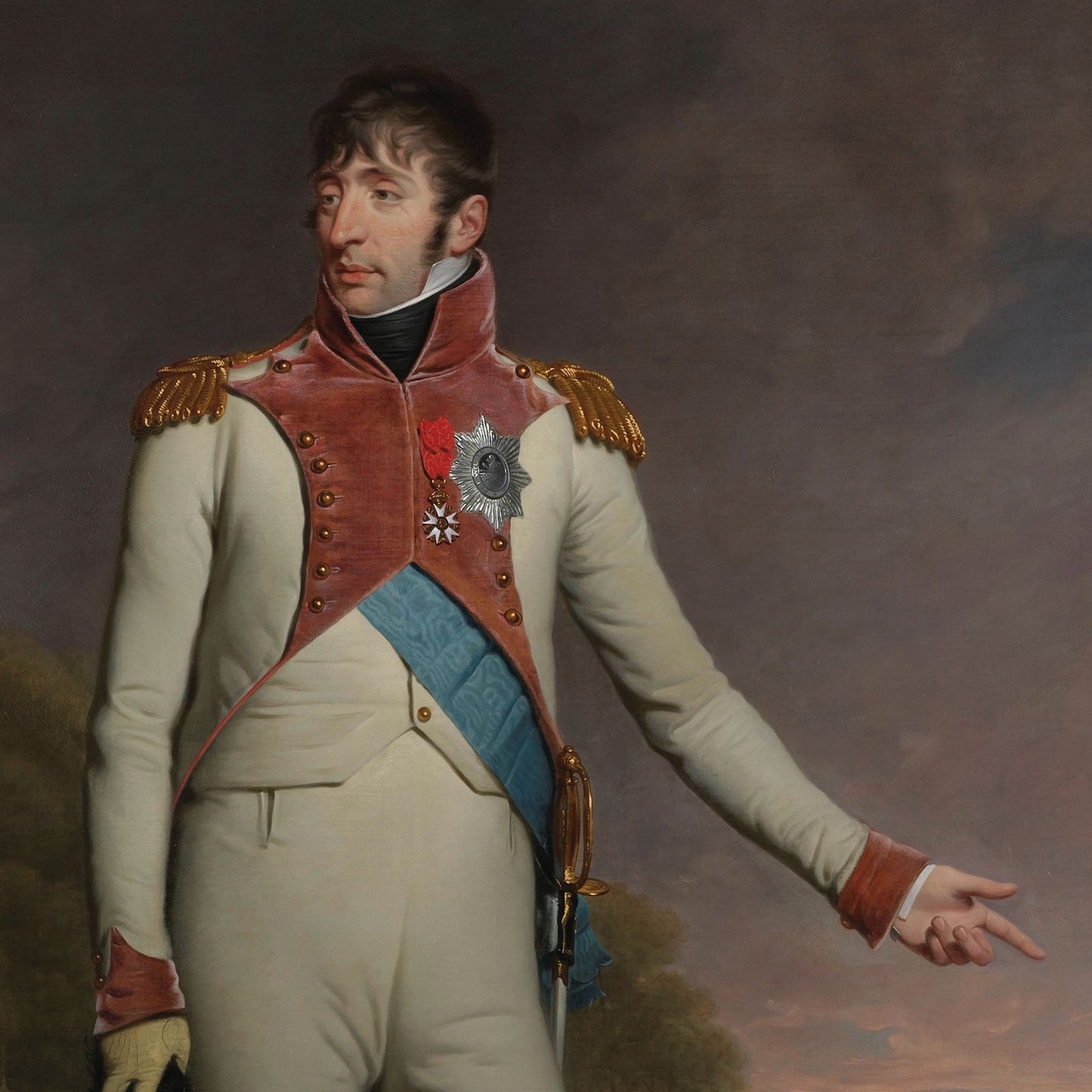 The "Portrait of Louis Napoleon - King of Holland" by Charles Howard Hodges depicts the king in a striking ensemble of white and red military attire adorned with gold epaulettes and various medals. A blue sash elegantly crosses his body as he stands with one arm extended, gazing to the side against a dramatic, cloudy backdrop.