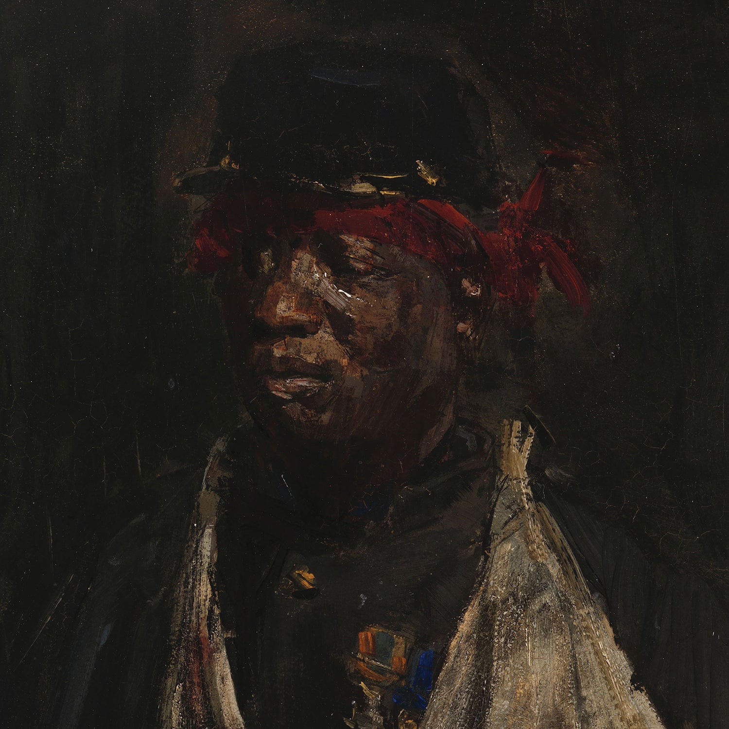 Portrait of a Wounded KNIL Soldier by Isaac Israels" features a somber depiction of a wounded KNIL soldier. The soldier is adorned with a black hat featuring brass accents and wears a red bandana tied around their head. Set against a dark, moody background, the figure is dressed in a dark uniform with military medals and has a worn cloth draped over their shoulders.