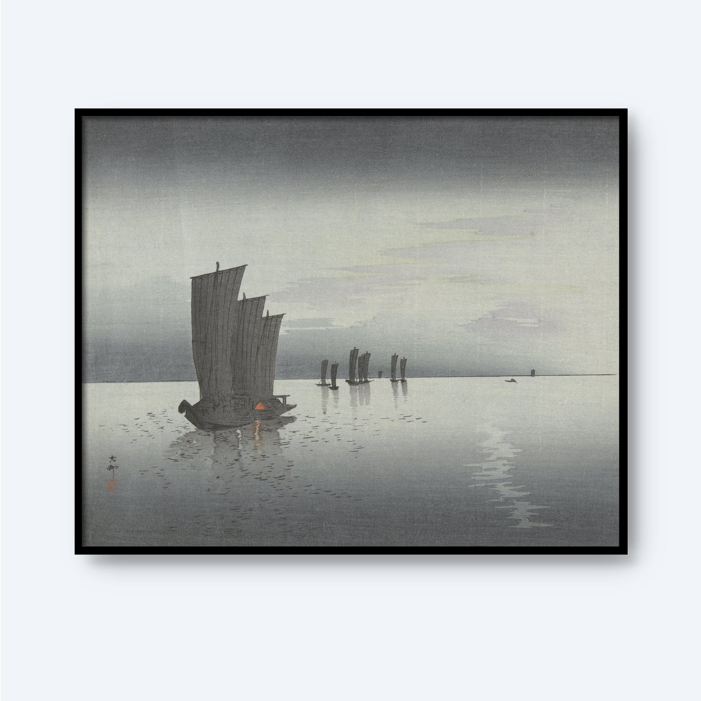 The "Ohara Koson – Fishing Boats at Sea" is a serene wall art piece depicting a calm, foggy seascape with traditional Japanese sailboats. The muted colors and soft brushstrokes evoke the minimalist beauty of Japanese woodblock printing, creating a peaceful atmosphere as the boats drift across the water, with subtle reflections shimmering on the surface.