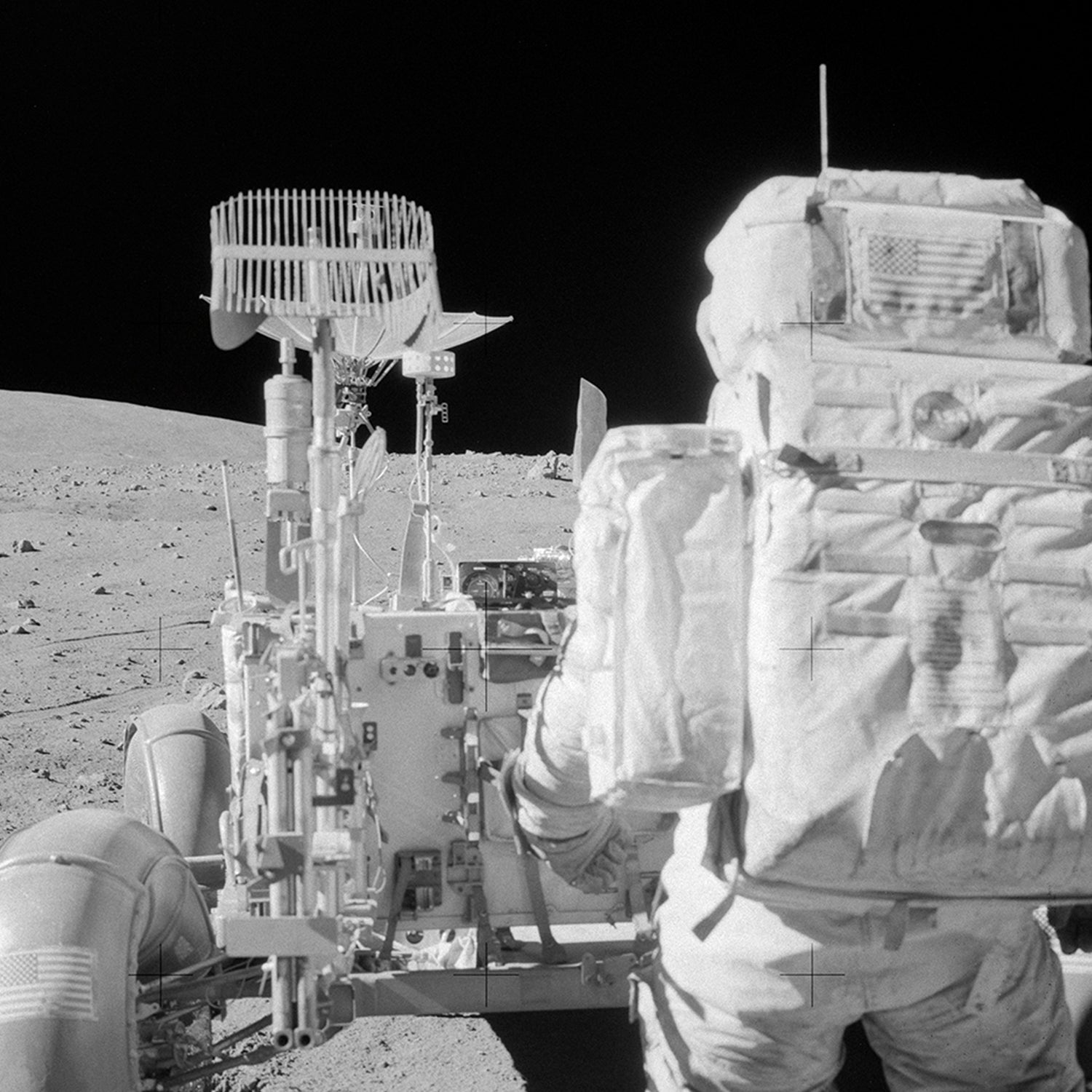 A NASA Apollo 16 Astronaut and Lunar Rover sit on the lunar surface, the astronaut clad in a white spacesuit that highlights its intricate details against the barren terrain. With Earth visible far off in the dark sky, this scene embodies the spirit of space exploration.