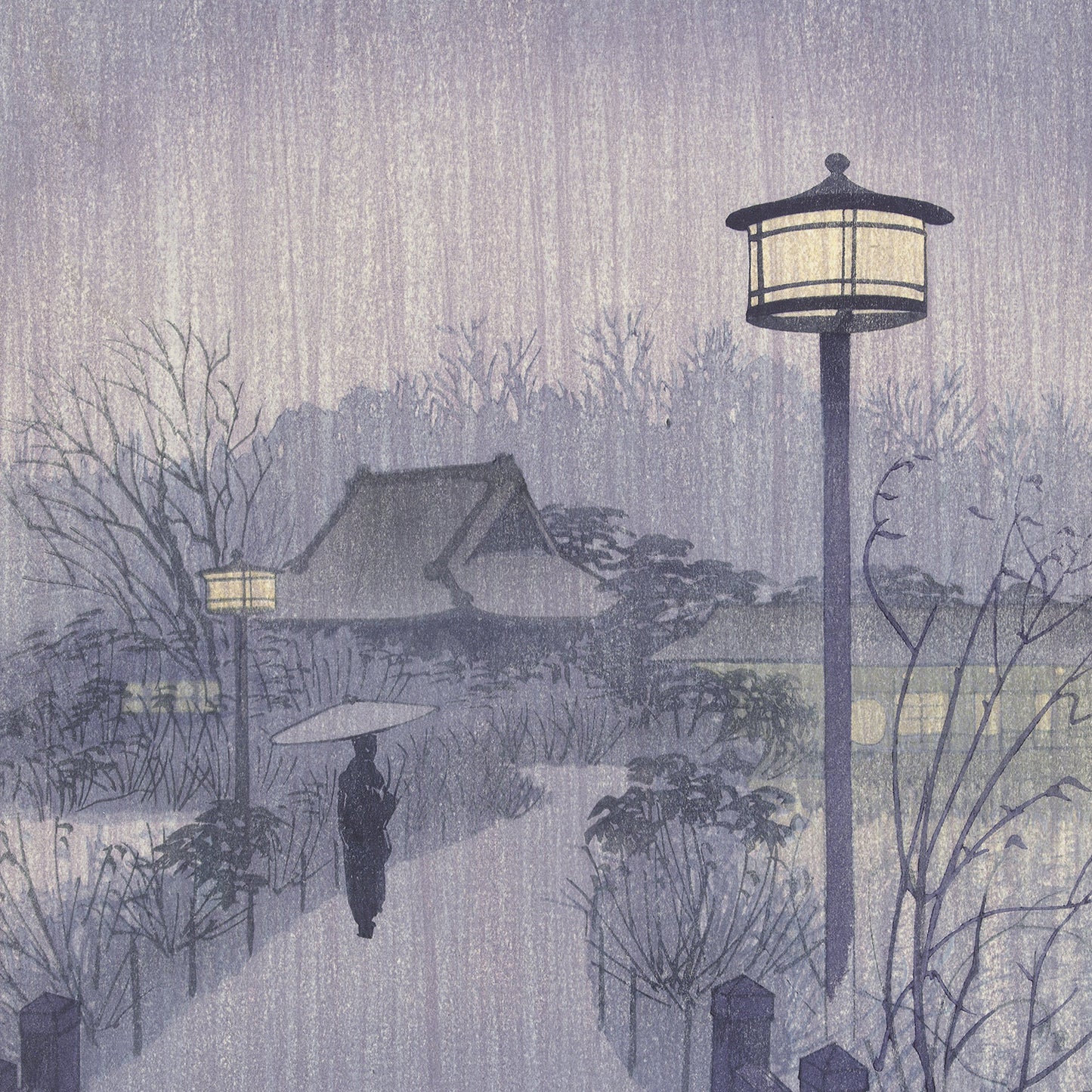 A serene winter scene resembling the wall art "Rainy Night at Shinobazu Pond" by Kasamatsu Shiro features a person holding an umbrella walking along a snow-covered path. Traditional Japanese lamps line the path, and a house with a slanted roof is visible amidst bare trees and shrubs in the background. Snowflakes gently fall from the sky.