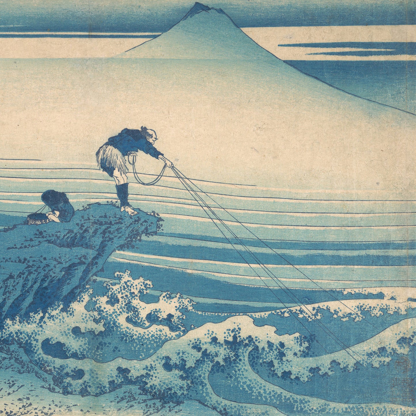 Kajikazawa in Kai Province" by Katsushika Hokusai, a traditional Japanese woodblock print, depicts two people on a rocky shore; one crouches over while the other stands and fishes with multiple lines. In the background, Mount Fuji rises above a calm sea. This scene is part of his renowned series "Thirty-Six Views of Mount Fuji.