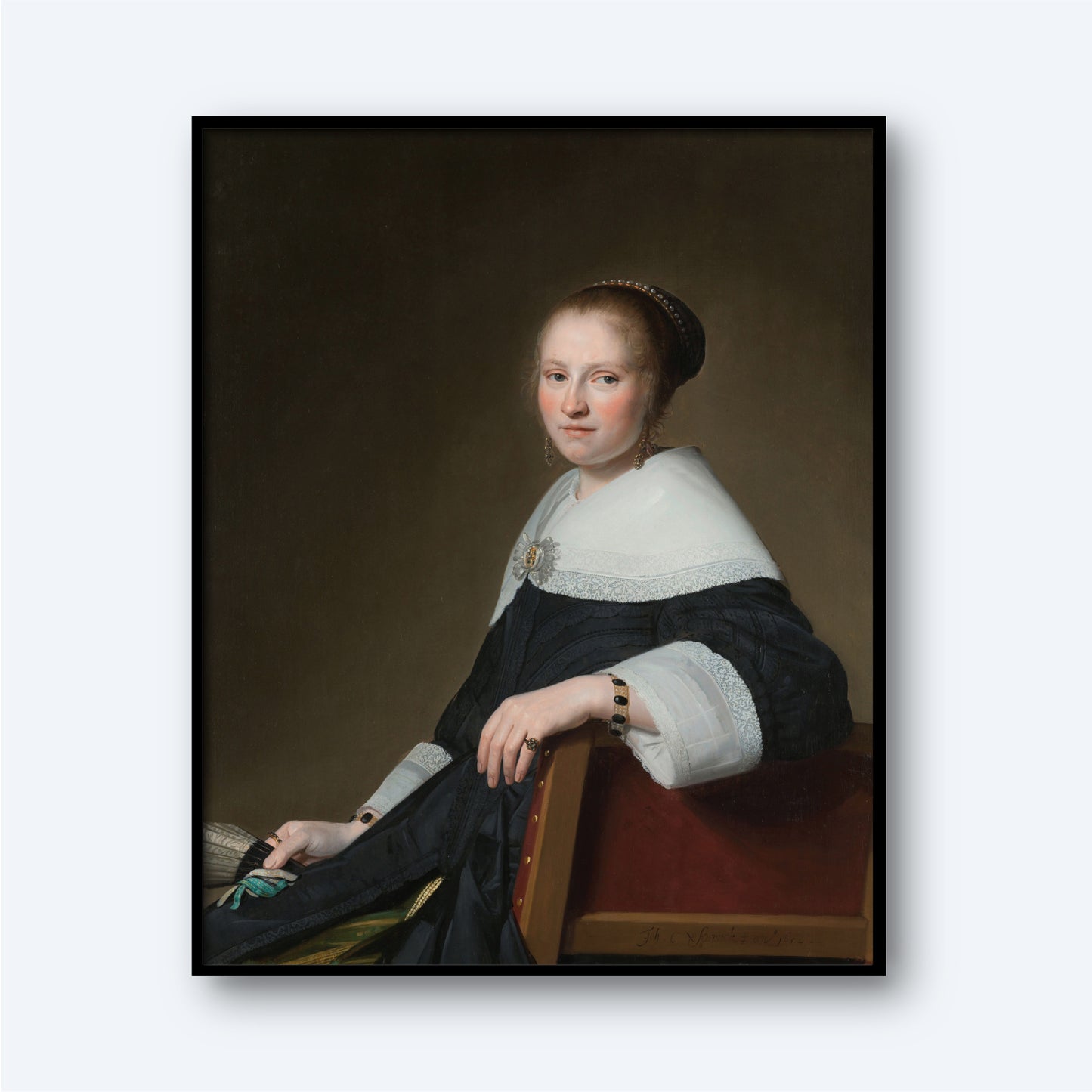 A portrait painting titled "Portrait of Maria van Strijp by Johannes Cornelisz" depicts a woman seated, dressed in a dark gown featuring elaborate white lace cuffs and a large white collar. She gazes toward the viewer, her hair neatly styled and adorned with a decorative headpiece. The dark background enhances the emphasis on the woman, evoking the elegance of the Dutch Golden Age in true Cornelisz fashion.