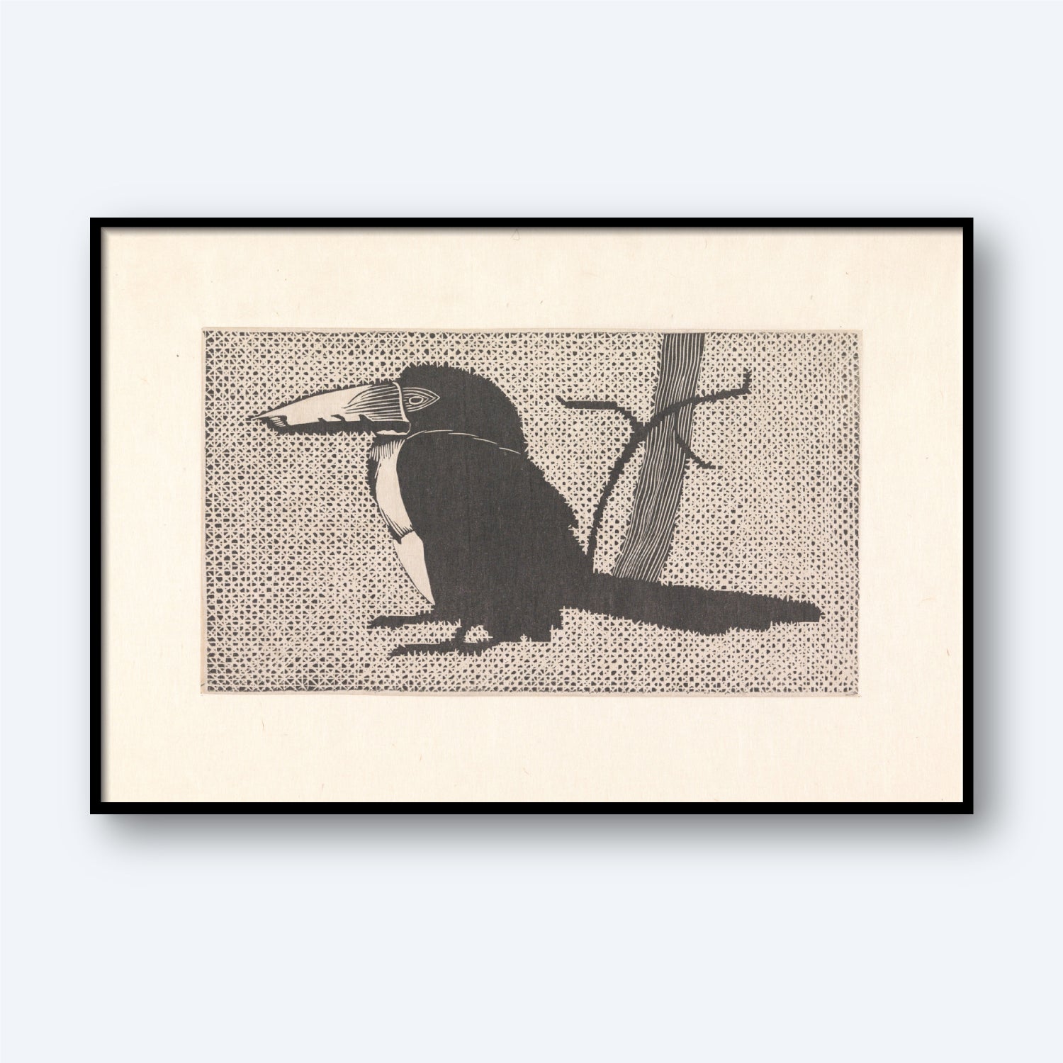 The "Toucan by Samuel de Mesquita - Vintage Print" features a black-and-white illustration of a toucan with a large beak perched on a branch against a dotted background. This vintage print, styled in the manner of Samuel Jessurun de Mesquita, is framed in a simple black frame and mounted on a light-colored wall.