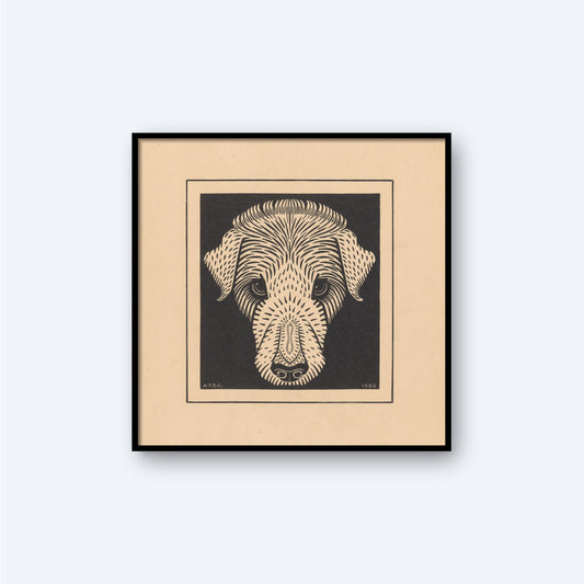 The Dog's Head by Julie de Graag Print is a framed artwork showcasing a stylized, black-and-white illustration of a dog's head. The textured, almost abstract appearance is achieved through intricate lines and shading, set against a light beige background that contrasts beautifully with the dark lines of this minimalist art piece.