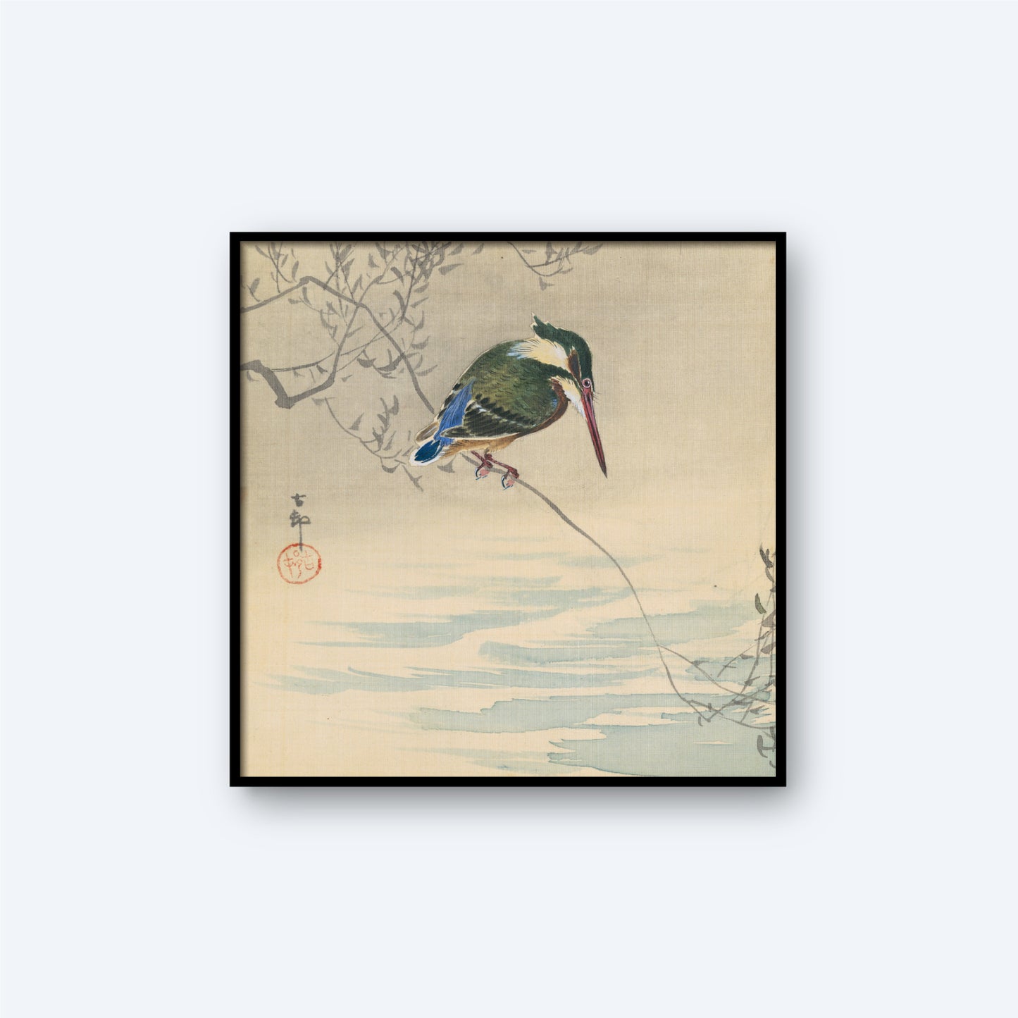 This vintage wall art print, "A Kingfisher by Ohara Koson 1920," captures a vibrant kingfisher perched gracefully on a slender branch above a serene body of water. The bird gazes downward, enveloped by delicate branches with sparse leaves, creating subtle reflections in the tranquil water below. It's perfect for anyone seeking elegant kingfisher wall art.