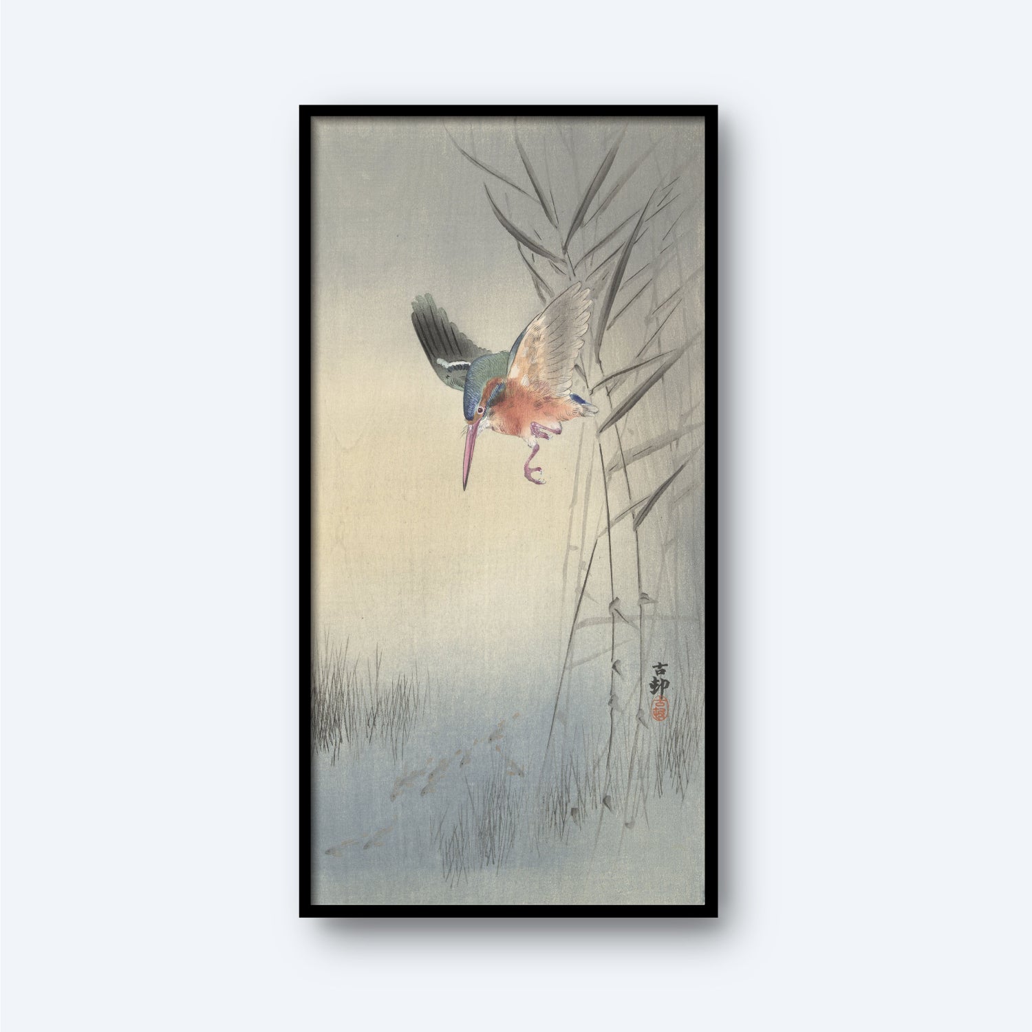 The framed artwork, titled "Kingfisher hunting for fish in the water," showcases a colorful Kingfisher hunting near tall, slender bamboo stalks and grass. The background features a soft gradient of pale colors, creating a serene and natural ambiance. The painting style is traditional and detailed, reminiscent of a vintage Japanese print by Ohara Koson.